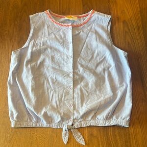 Light blue sleeveless, button-front blouse, tie at bottom.  Coral trim at neck.